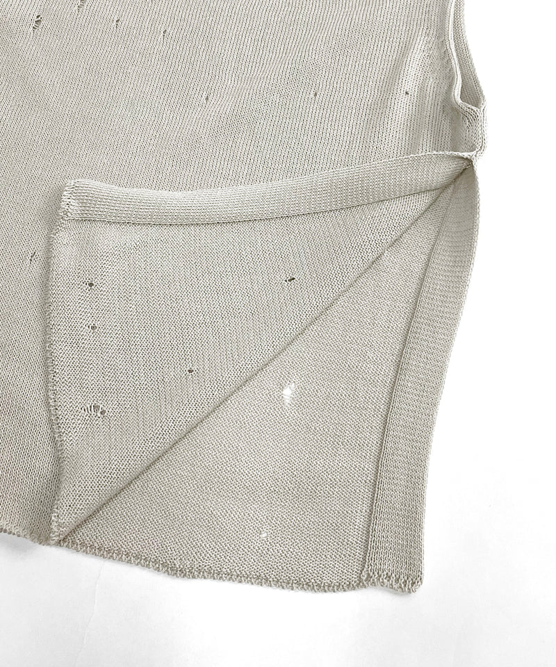 Damaged knit vest